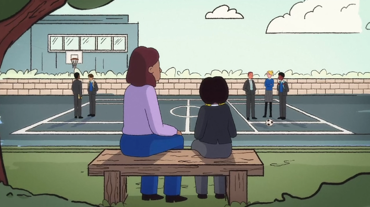Two people, likely a teacher and student, sit on a bench observing other students interacting on a school playground with a basketball hoop and soccer ball in the background.