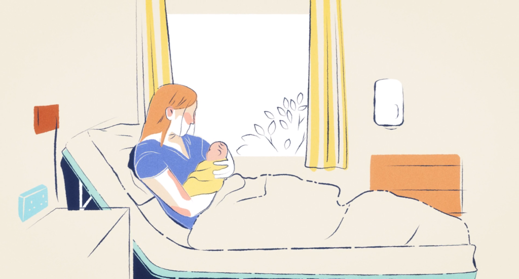 A woman sits in a hospital bed cradling her newborn, gazing out a window with yellow curtains, capturing a quiet, intimate post-birth moment.