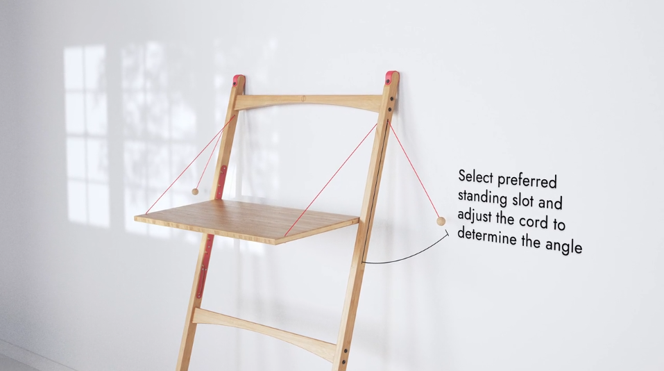 Wooden leaning desk mounted on wall with adjustable red cords, showing text: “Select preferred standing slot and adjust the cord to determine the angle.”