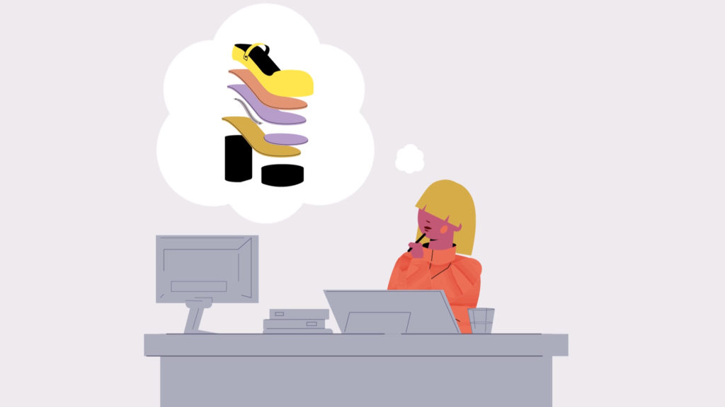 Woman at desk with pencil thinking about shoe layers including sole, insole, and heel in a thought bubble.