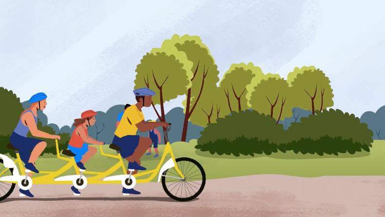 Family enjoying exercise together in nature, promoting healthier choices and quality time outdoors.