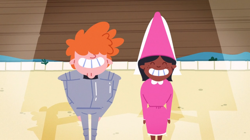 A smiling boy in a knight costume and girl in a pink princess outfit stand together on a stage.