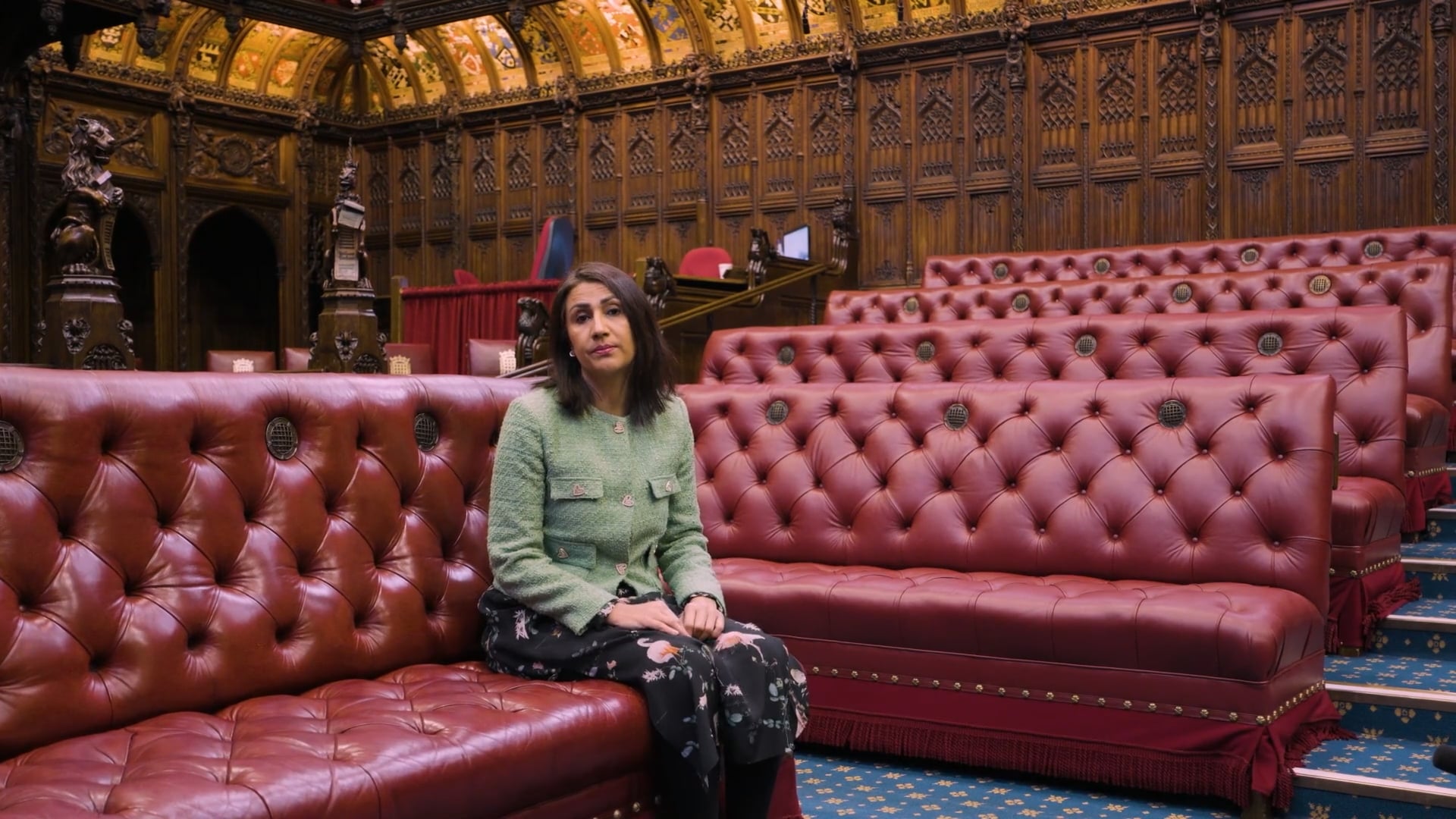 A photo of photograph of Baroness Gohir sitting at the House of Lords parliamentary chambers.