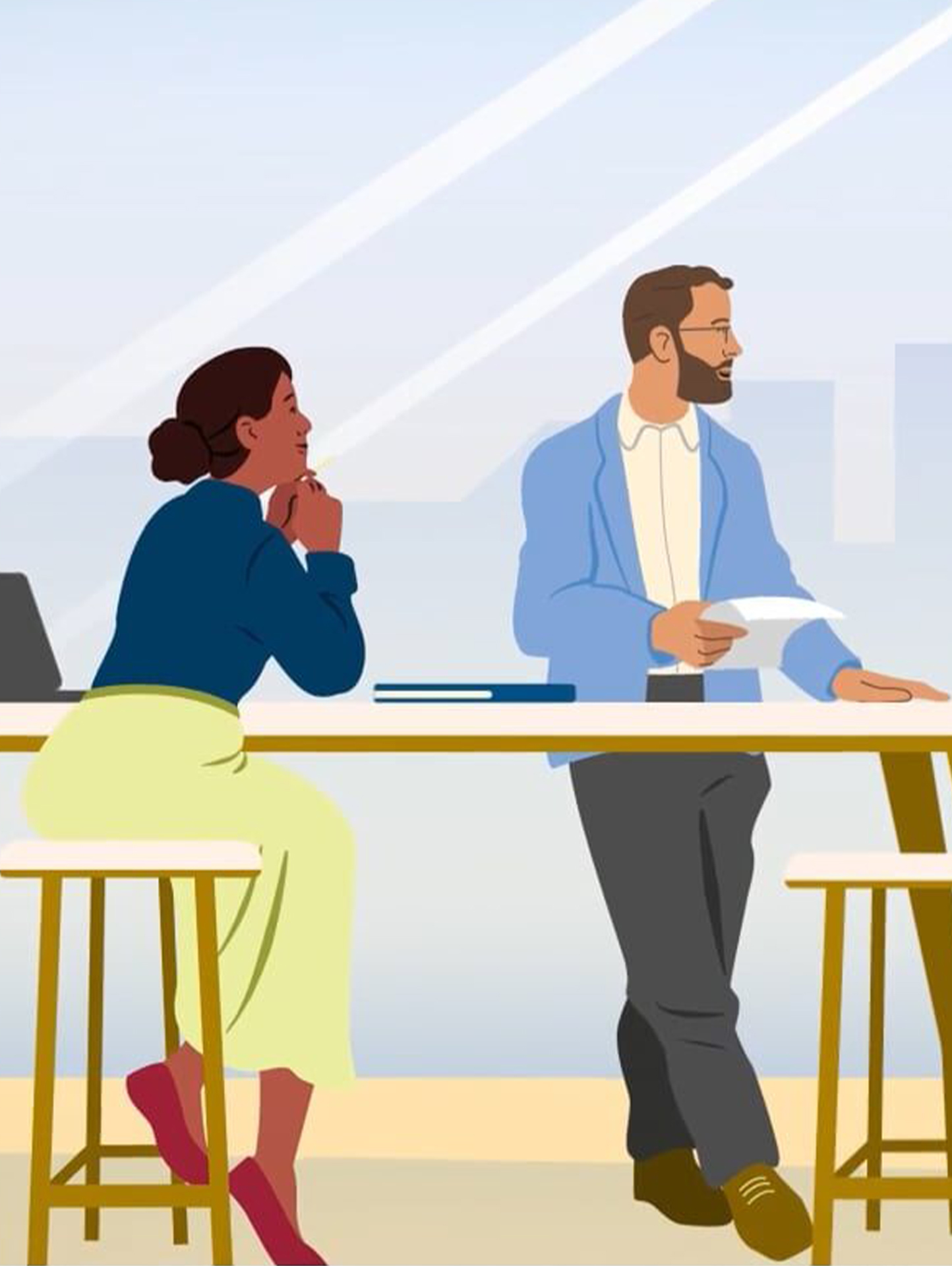 Two diverse colleagues collaborating in a modern office space